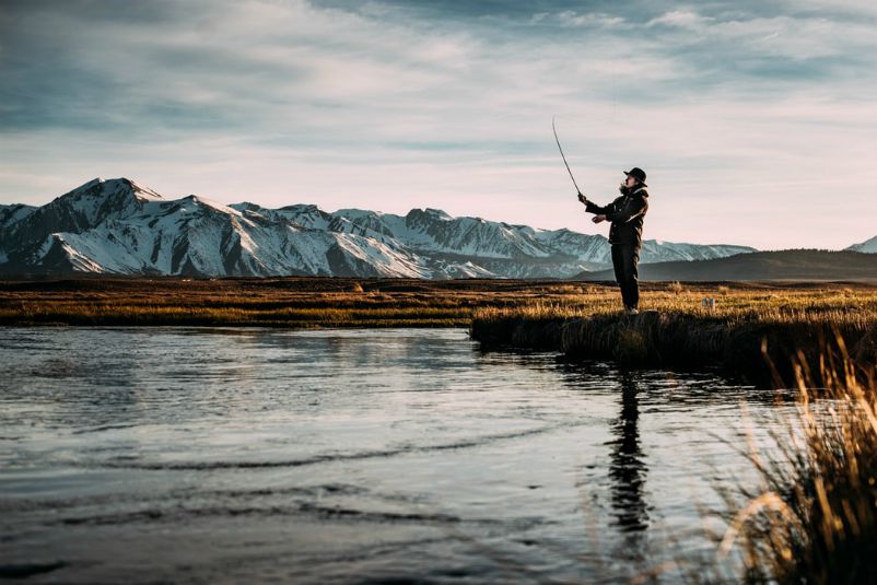 Image of a Man Fishing. Photo Credit to Robson Hatsukami Morgan at https://unsplash.com/photos/qr7tsSwDOg0